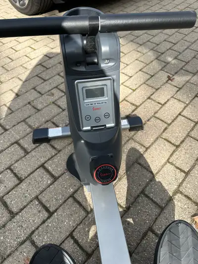 Get your sweat on with this Sunny SF-RW5941 rowing machine, perfect for a full-body workout at home!...