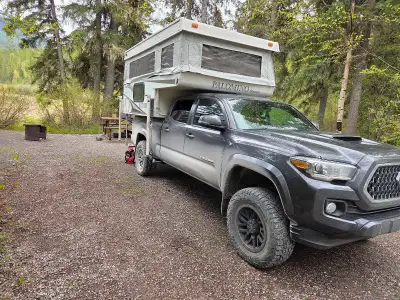 Small truck camper Awesome condition Fridge works Furnace works Sink works Camper jacks Upgrading to...