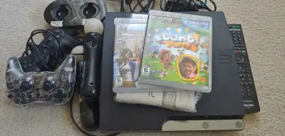 Ps3 Slim console with 4 controllers, View more