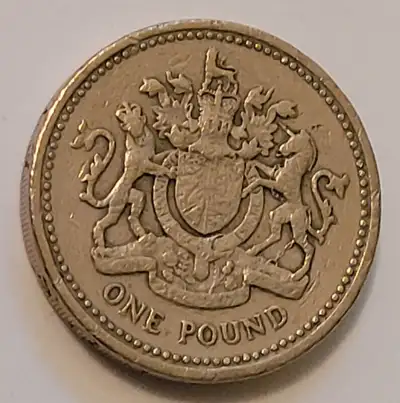Vintage 1983 One Pound 1983 Royal Arms, Coin from United Kingdom Nickel-brass was introduced in 1983...