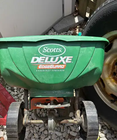 Spreads seeds no problem but wheels stick, doesn’t move smoothly