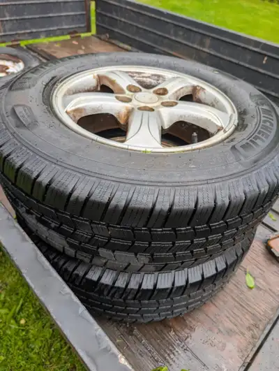 Upgrade your ride with the gold standard of all-season tires. This is a complete set of Michelin Def...