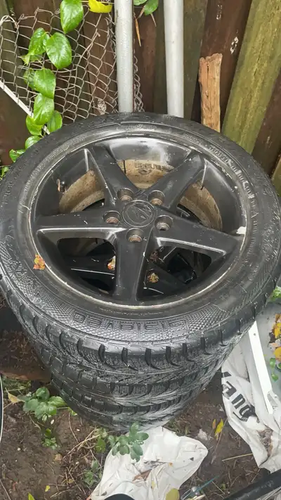 16 INCH ACURA ALLOY RIMS with center caps. Some road rash but rims are straight. Comes with 205/55 R...