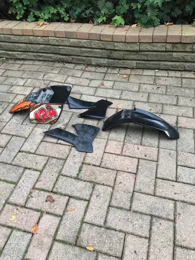 Not sure of year, ktm65 plastics and Kawasaki front and rear fenders, $25 each set
