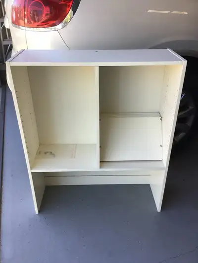 White bookshelf. 31 1/2” w x 38”h 4 adjustable shelves. Good condition. Call (780)237-5317
