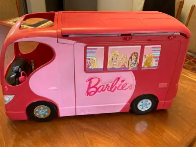 Barbie camper in good condition - includes original furniture, and door and roof open. Best offer. P...