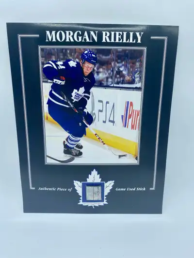 Morgan Rielly Toronto Maple Leafs Piece of Game Used Stick - Grates of the Game COA -Size is 8x10 -J...