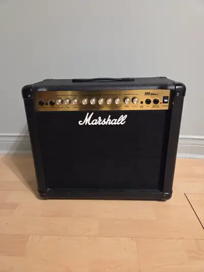 Marshall MG30DFX guitar amp. Comes with footswitch to change between clean and overdrive channels. U...