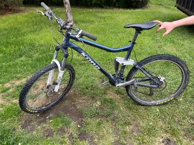 Kona full suspension mountain bike, frame size is medium to large. Shifts great, rides great just go...