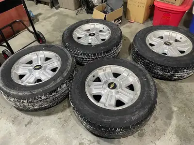 set of chevy or gmc 18" tires and rims tires decent 600.00 obo can see anytime in heated garage
