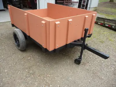 Lawn & garden trailer. Bed is 4 ft 6 inches wide x 6 ft 6 inches long. Sides are 21 inches high. Fra...