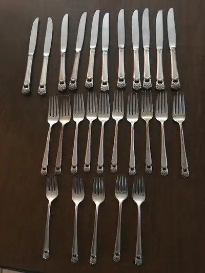 -Rogers Bros. Silver plated IS flatware -“Eternally Yours” pattern -Includes: 11 dinner knives, 10 d...