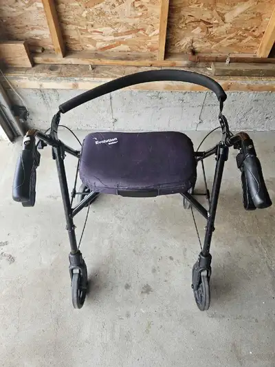 Selling a highly stable 4-wheel rollator walker chair. This features a solid, non-folding frame desi...