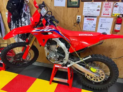 CRF450RX brand new, never been used!! Stored in heated garage. I had front and rear lights installed...