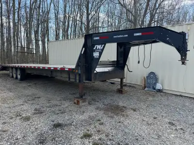 Total length is just over 43’ Deck length is 35’ 8” Deck width is 8’ Stake pockets Front storage box...
