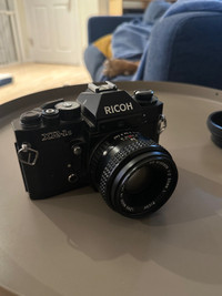 Ricoh XR-1s 35mm film camera (comes with a rubber hood)