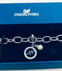 Brand new in box Swarovski charm bracelet with Sagittarius charm