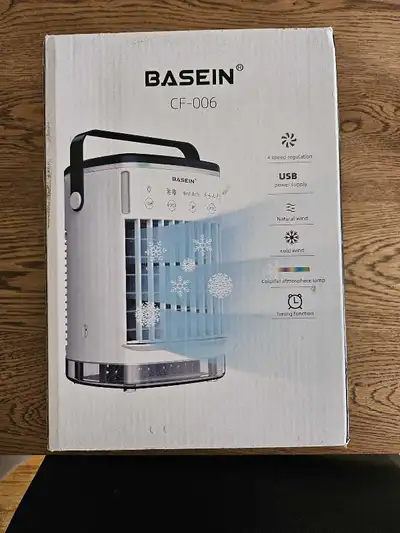LIKE NEW! Keep cool this summer with this BASEIN CF-006 portable air conditioner fan, featuring 3-sp...
