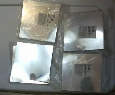 new mirrored tiles 20 per package 6"x6" these are thicker than paper can be cut with scissors $15.00...