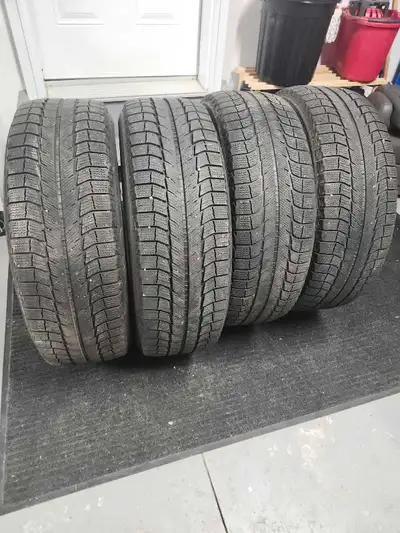 4 x top of the line winter tires. Were on my Honda Odyssey. Just the tires. No holes or plugs.
