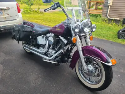 Gorgeous 2016 heritage softail in exc cond, near new. Needs nothing Rare color purple fire/blackberr...