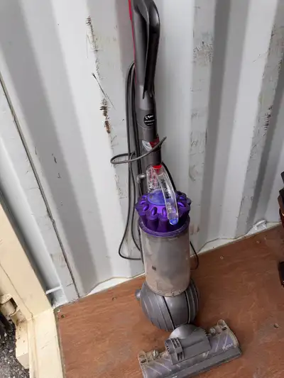 Keep your home clean with this Dyson DC66 vacuum! This upright vacuum is designed for powerful sucti...
