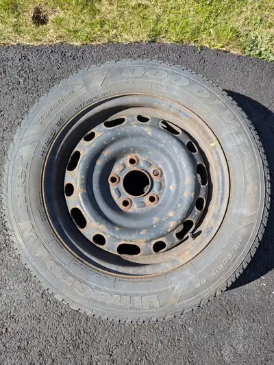 Goodyear 215/60R16 UltraGrip Winter tires on 16" steel rims 5 bolt from a Mazda 6. 3/16" tread left...