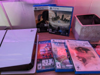 Like new PS5 with 2 controllers and 5 games. Comes with box. 