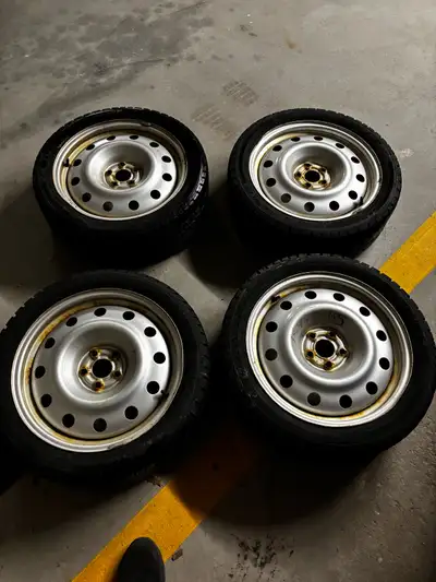 Selling a set of 4 tires mounted on rims, size 215/45R17, previously used on a 2021 Toyota Corolla....