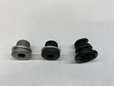I have three different drain plugs and lots of each. The one on the right is only for plastic oil pa...