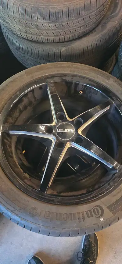 Set of 4 rims and tires. 235/45R17 continental tires