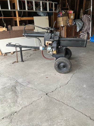 Wood splitter with 196cc motor. 24 tons in good working condition. Splits wood vertical or horizonta...