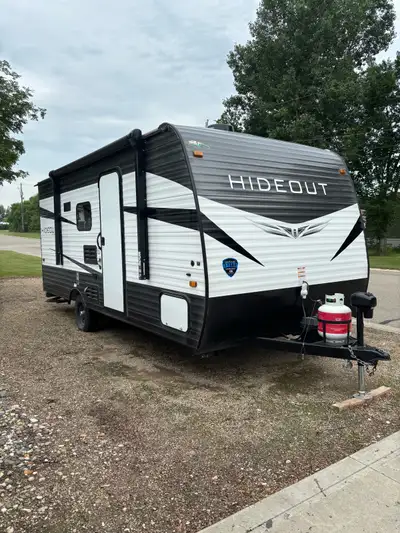 17 foot Hideout Trailer. Year 2021, model 175BH. 1 owner, mostly used locally. No slides. Sleeps 5 c...