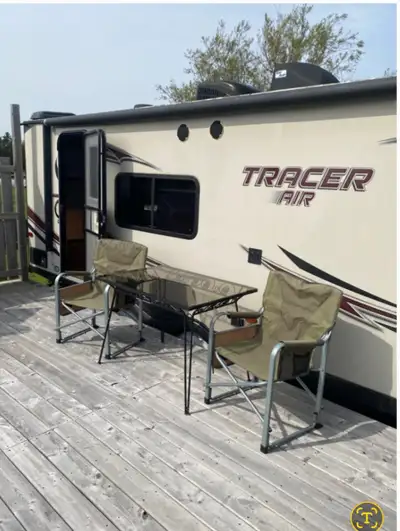 Very good condition. 28 ft. one slide, Ac, 2 way fridge, tv, power awning, stainless appliances, sof...