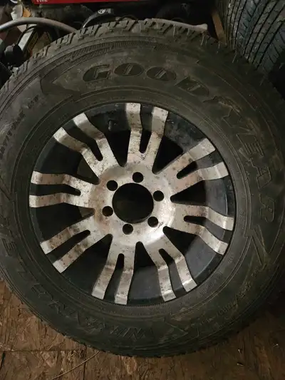 Set of 4 gn truck wheels, all in roughly the same condition. Only 1 center cap Will fit most stuff '...