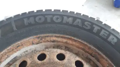 Four Motomaster Winter Edge II 215/60R16 on steel rims, fair condition, still usable tread.