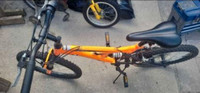 Orange Huffy bike