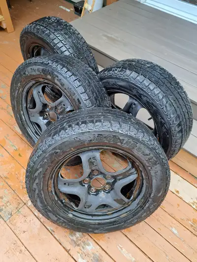 Used one season on GMC Terrain Set of 4 -- Yokohama Ice Guard 225/60R17 on black rims, 5 bolt patter...