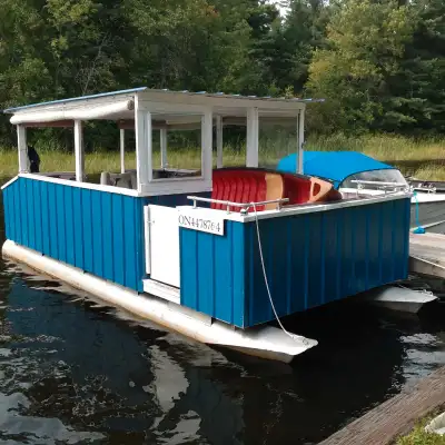 Pontoon boat. See photos. No trailer, motor is not working but it's a 40hp Force. You must pick up....