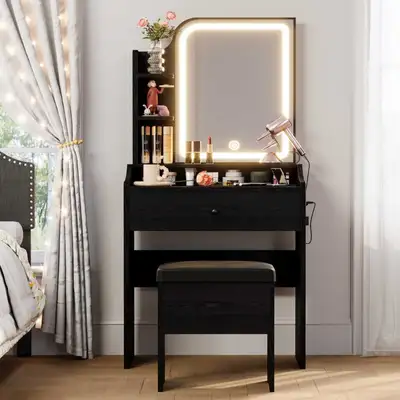 Brand new makeup vanity and stool with storage. Purchased on Amazon, but decided to use something di...