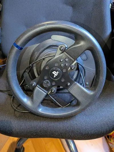 Selling a Thrustmaster T300 steering wheel with pedals in excellent condition. It was only used a co...