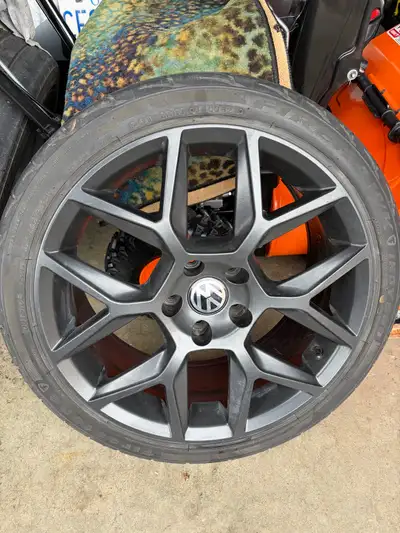 Selling a set of used Volkswagen summer tires and rims, perfect for enhancing your vehicle's perform...