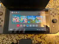 Nintendo switch + games, dock and controller