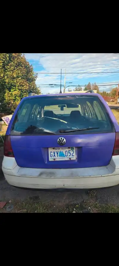 Purple jetta wagon hatch. Has been worked on but it's pretty solid and wouldn't take much to paint....
