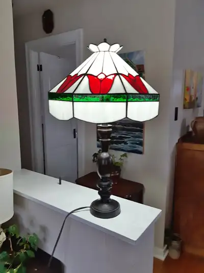 Excellent condition. 29"H. Shade is 16" in diameter. Heavy base. Price is firm.