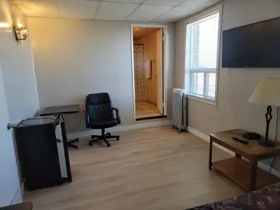 Didsbury Inn : 1. $1000/Month. This Large furnished bachelor room offers a comfortable living space...