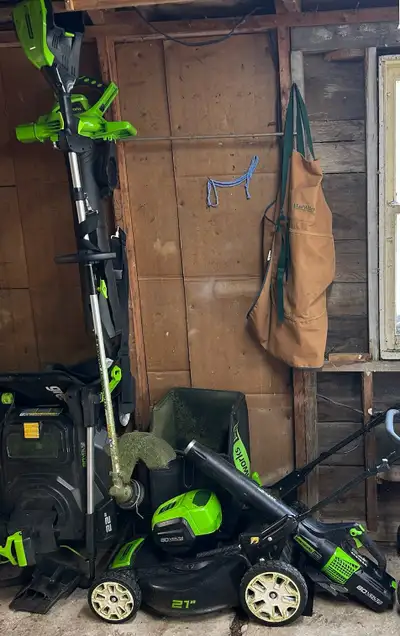 ** Moving Sale ** Greenworks Lawnmower, weed wacker, blower. Electric battery powered and environmen...