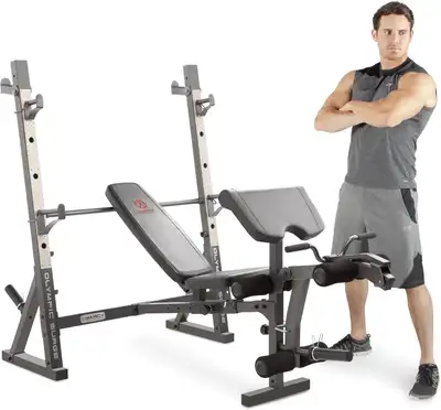 Like new, only used for a short time. Located in St. Catharines. Includes two silver 50LB cast iron...