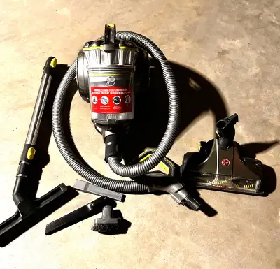 Hoover Canister vacuum hardly used and in new condition. Has a hepa filter and works very well. Cash...