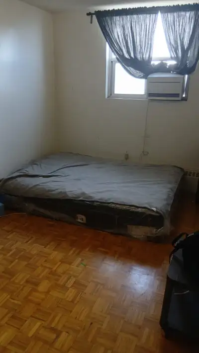1 bedroom in a 2bedroom apartment. 2 new Nigerians one is moving out. A Nigerian guy in the other ro...